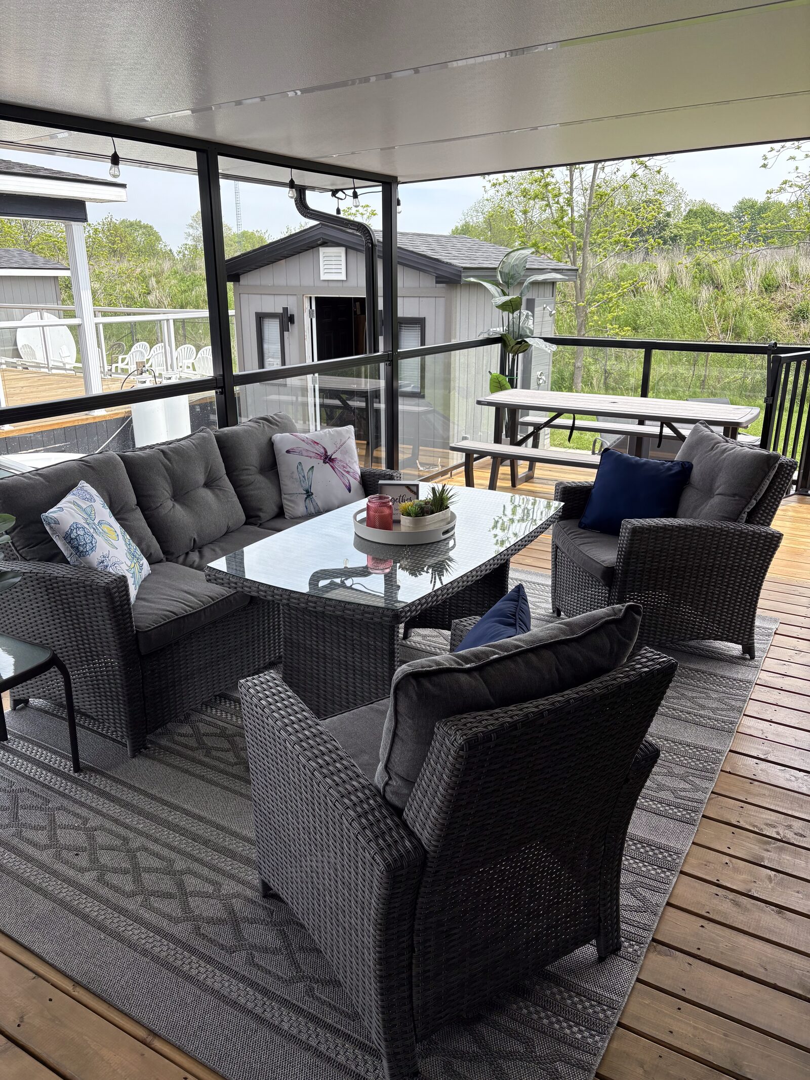Covered deck with wicker conversation set