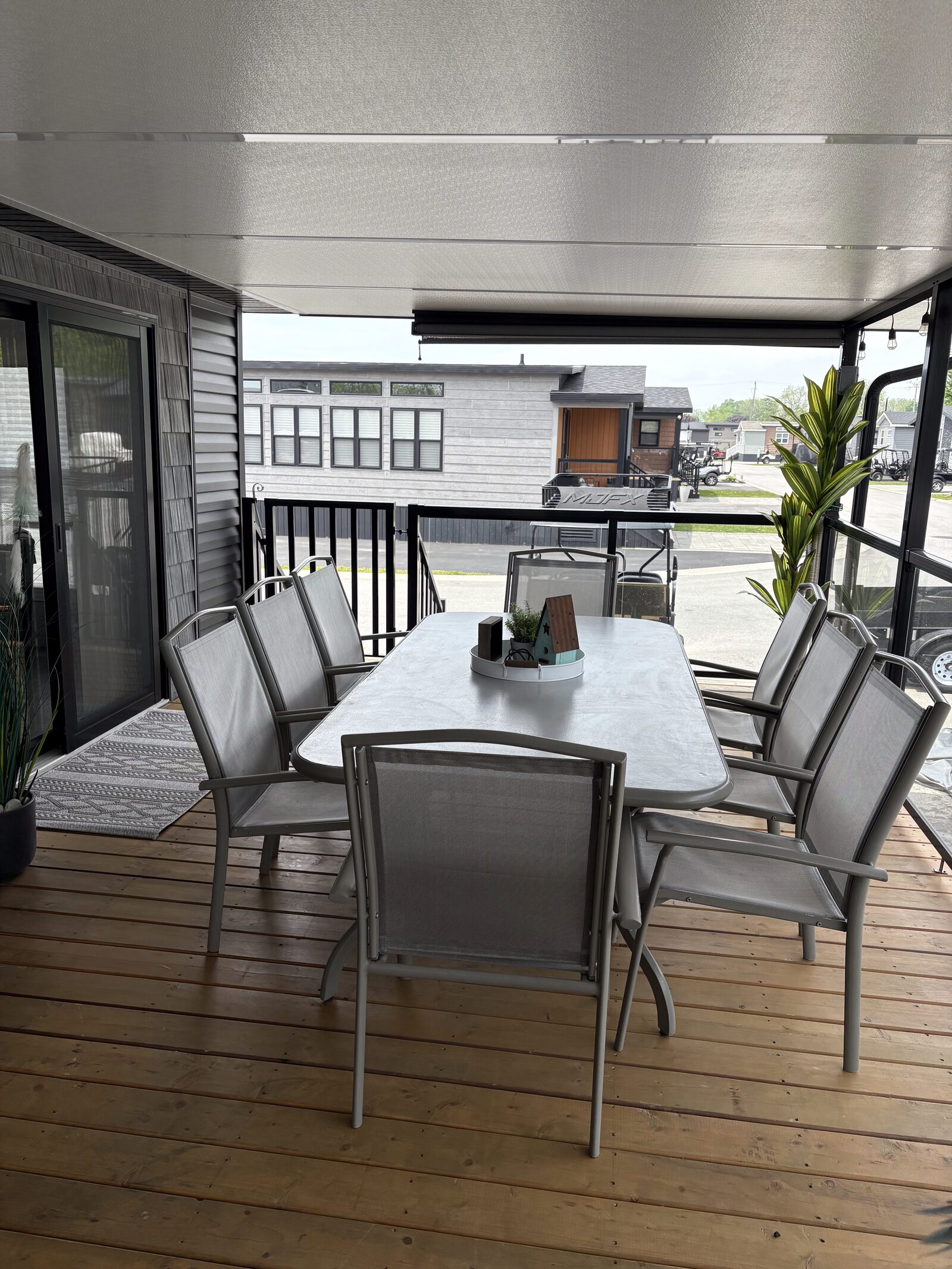 Covered deck with dining table for six